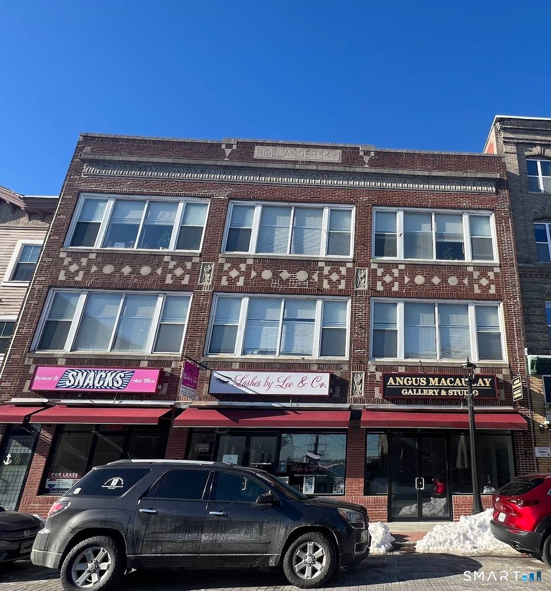 Mixed use property with 4 commercial units and 6 apartments located in the heart of downtown New London.