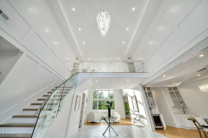 Welcome to this stunning, brand new built 39 Westmount Drive, a rare offering that combines architectural elegance with modern luxury in one of Livingston's Bel Air, most coveted neighborhoods.