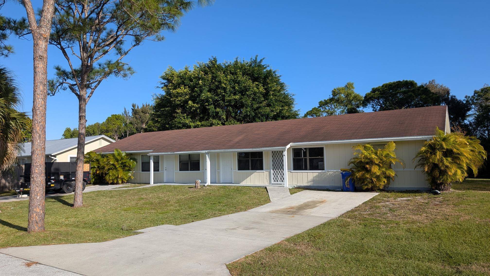 Discover this LOCATION, LOCATION, LOCATION in Stuart Florida set among mature trees mostly single family home residences.