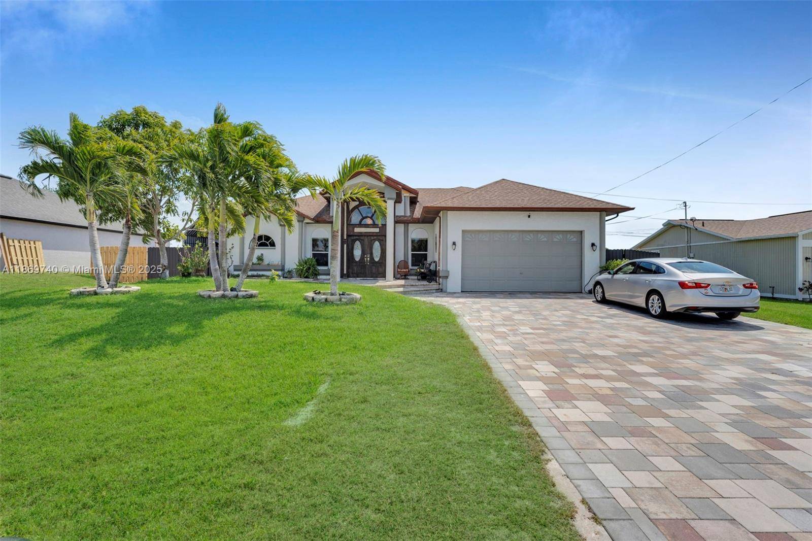 Stunning Dual Owner suites 5 Bed, 2 story home with 3 full baths and 2 half baths in the heart of Cape Coral !