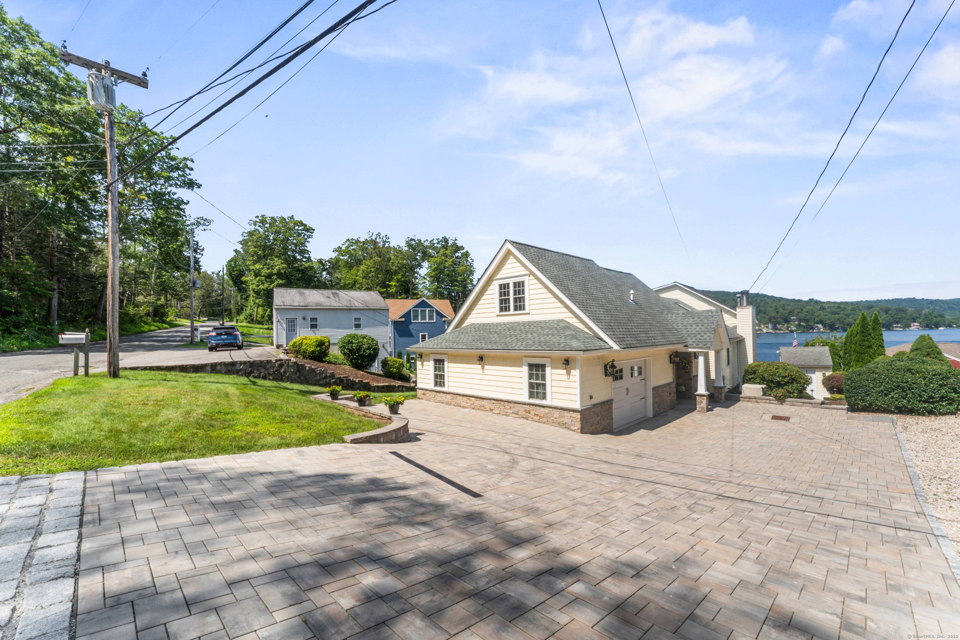 Experience premier waterfront living on Highland Lake in this beautifully maintained 3 bedroom, 3 bath home offering stunning panoramic lake views and direct water access.