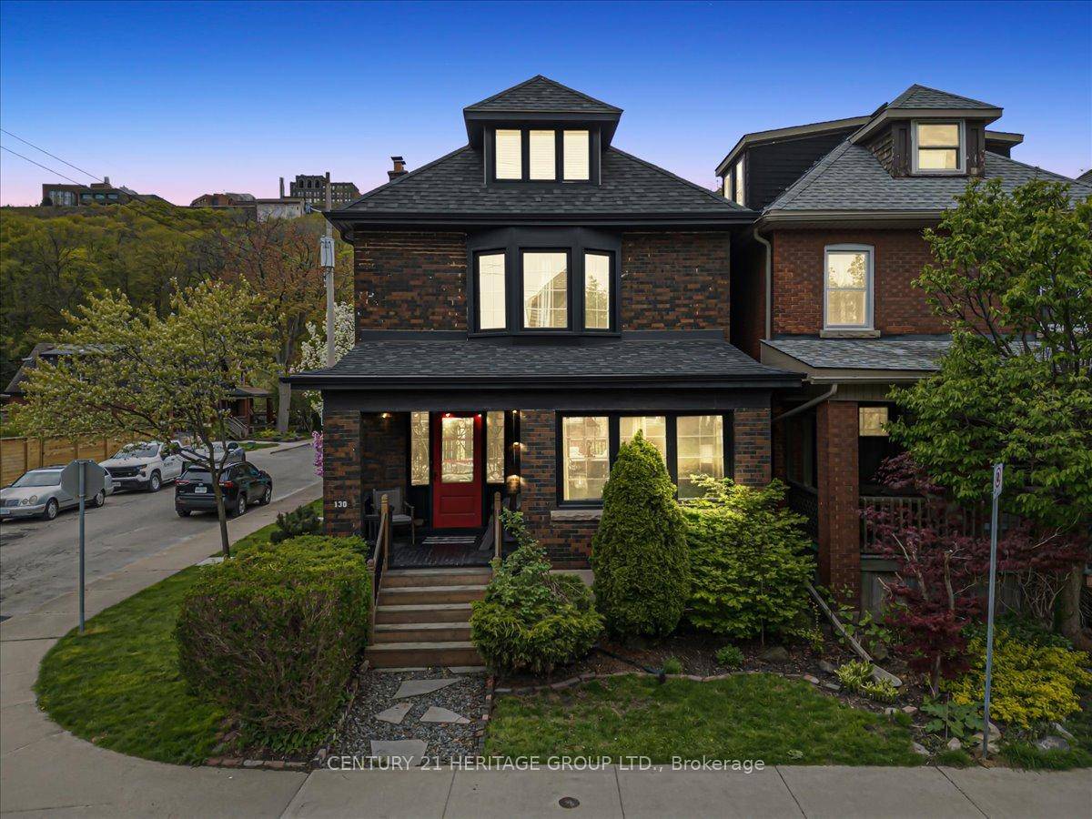 Nestled just beneath the escarpment on a quiet corner, this stunning character home blends timeless charm with modern luxury.