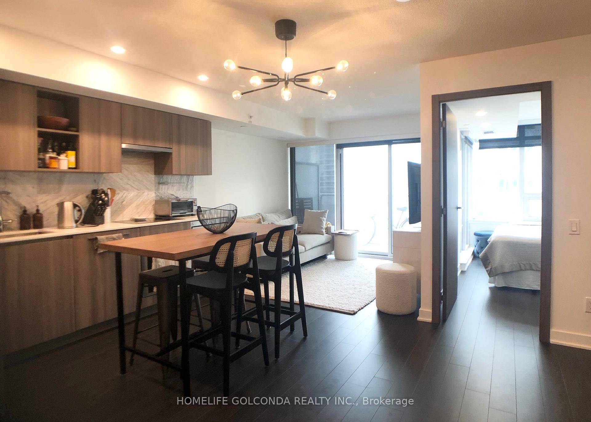 Fully Furnished Bright amp ; Spacious 1 Br Den, East Facing, Modern Kitchen, Elegant Marble Bathroom, Functional Layout, Laminate Floor Throughout.