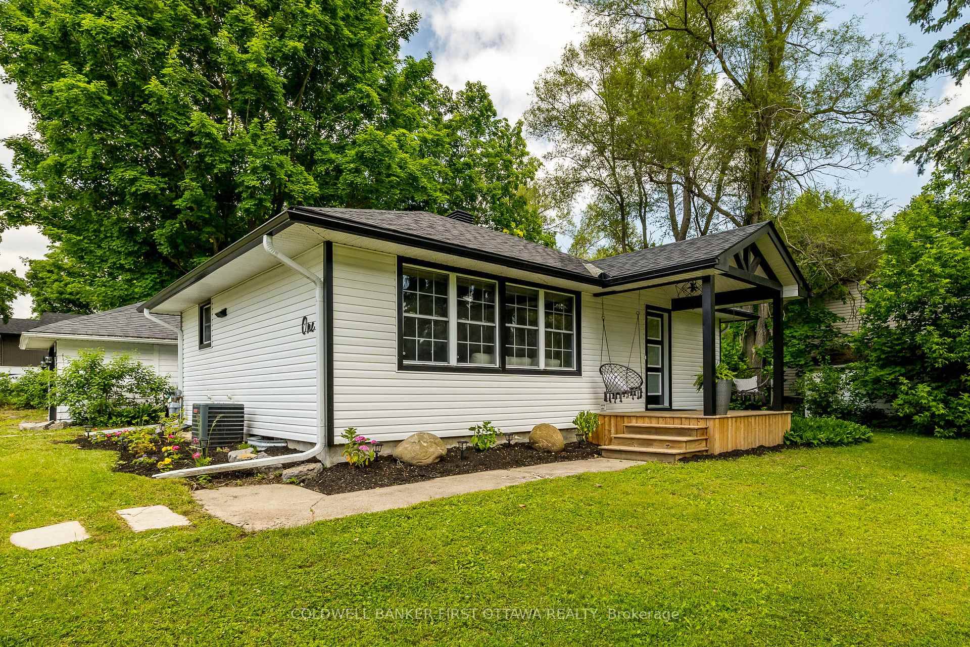Welcome to this beautifully updated 2 bedroom bungalow, nestled on an expansive corner lot brimming with potential.