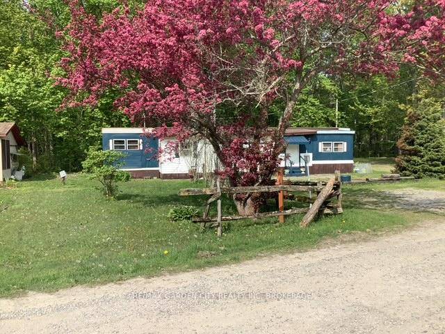 Year round affordable living at Sandy Acres Park in Lowbanks.