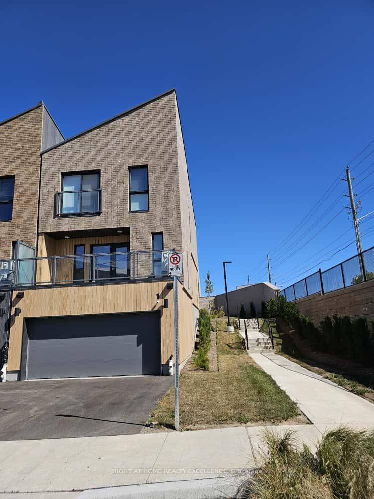 2 Years New. 3 bedroom End unit 3 Story townhouse in prestigious Trussler West community, Kitchener.