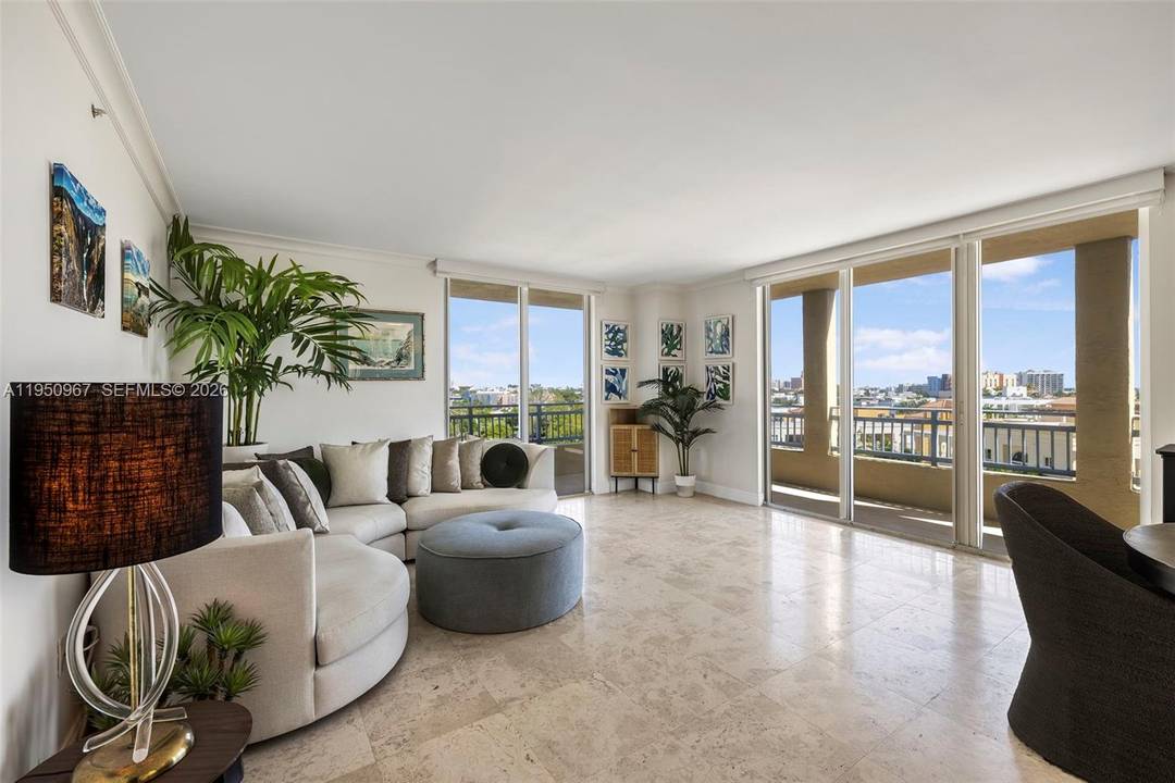Rare corner residence at The Yacht Club featuring a wraparound balcony with Marina views in the coveted South of Fifth neighborhood.