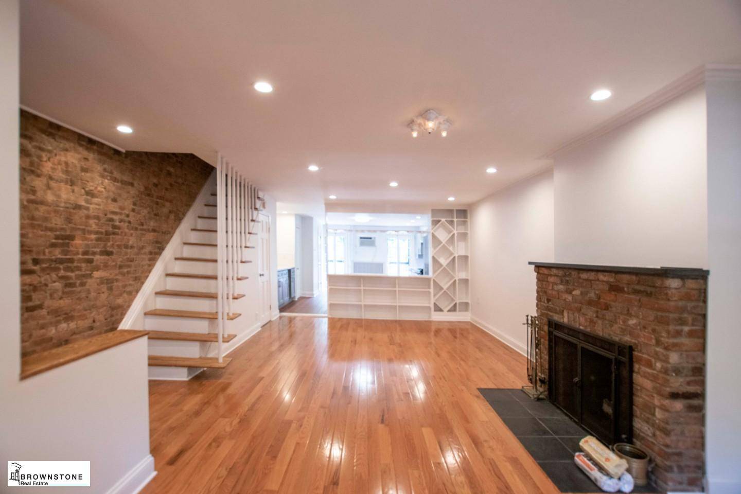 Enter into this spacious owner's lower duplex on a quiet tree lined block in Carroll Gardens through a charming areaway with iron bench and lilac bush.