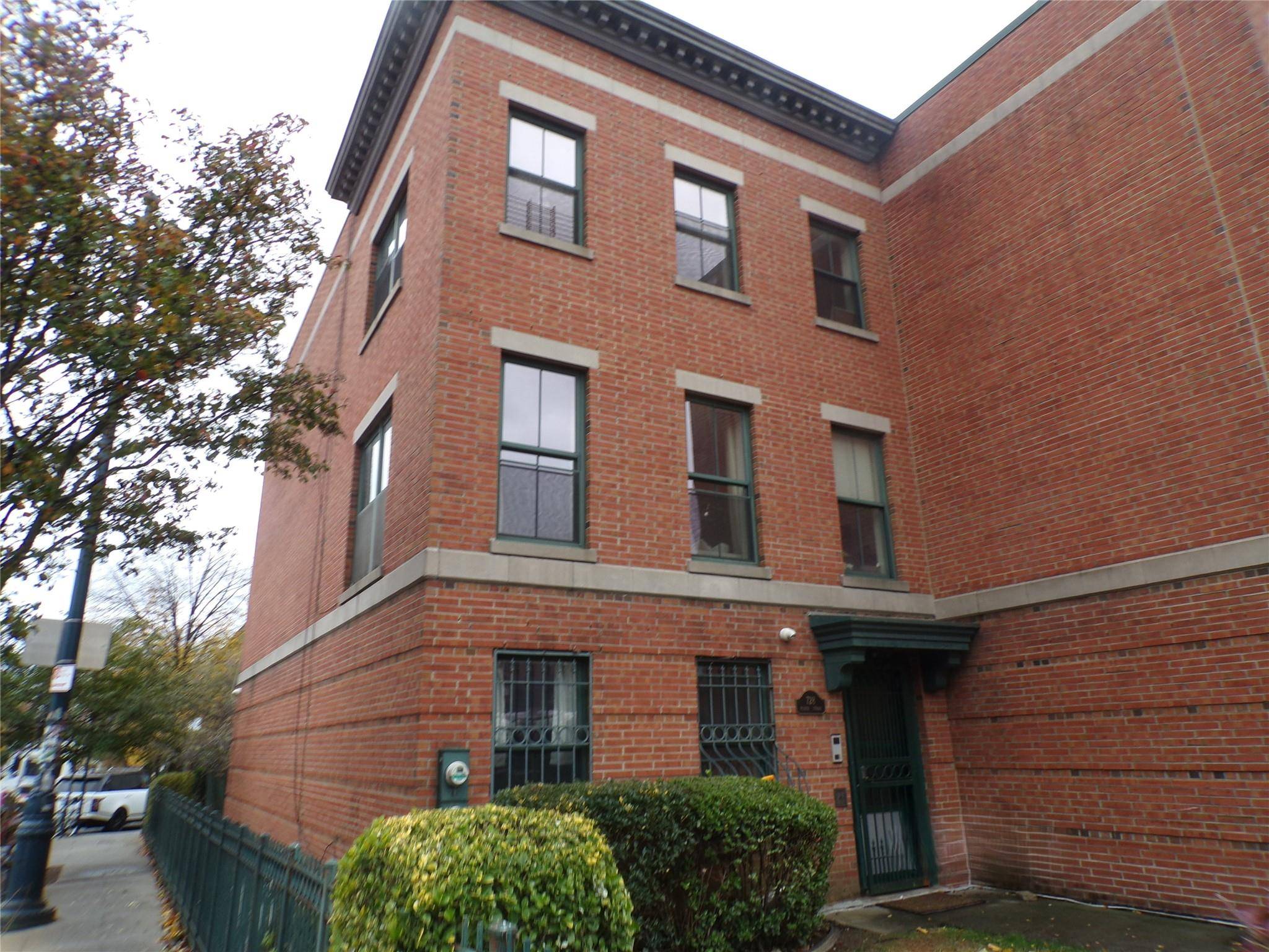 Beautiful Forte Greene updated 3 family brick home.