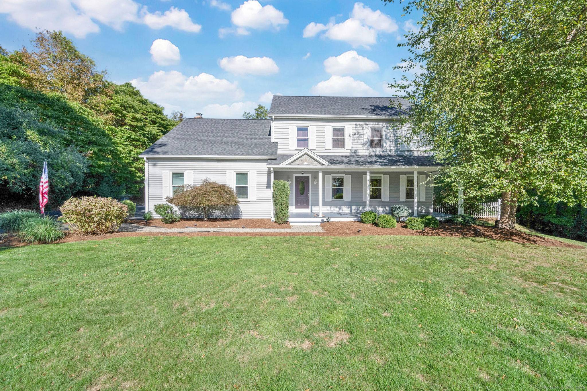 Nestled on a quiet cul de sac set on a beautifully private, 1.