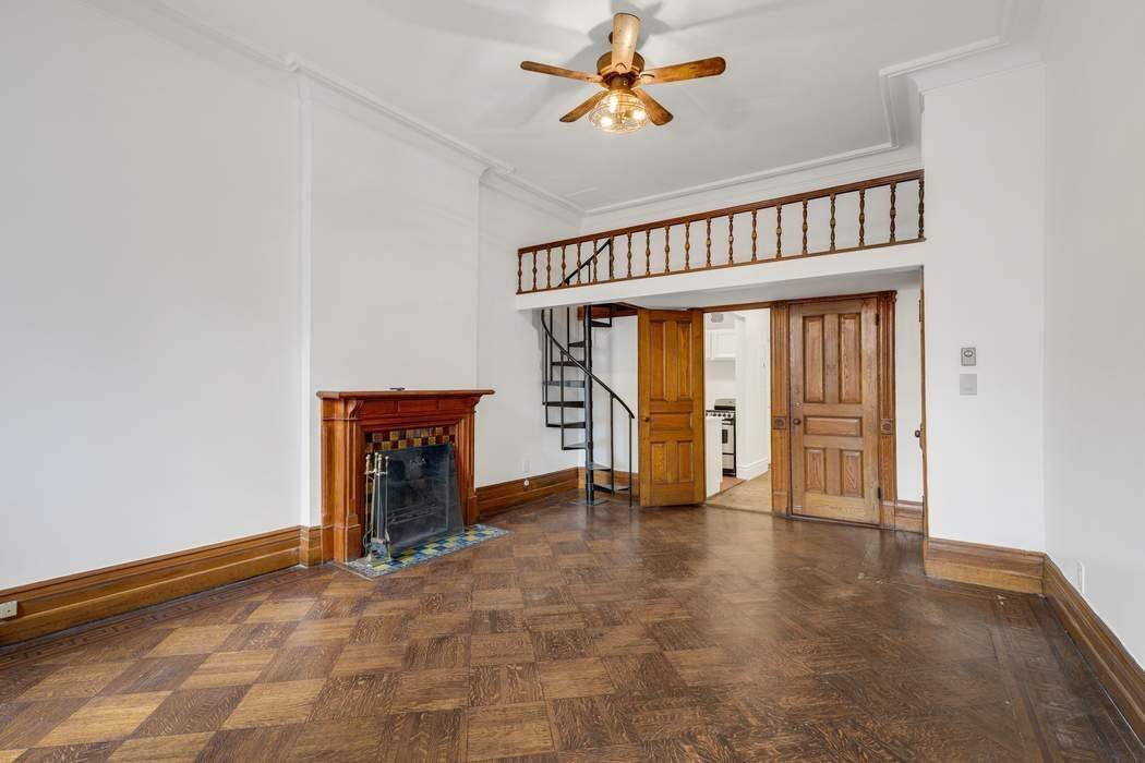 This turn of the century townhouse has been converted to four floor through residences, each retaining details reminiscent of the grandeur and style of 1890's New York.