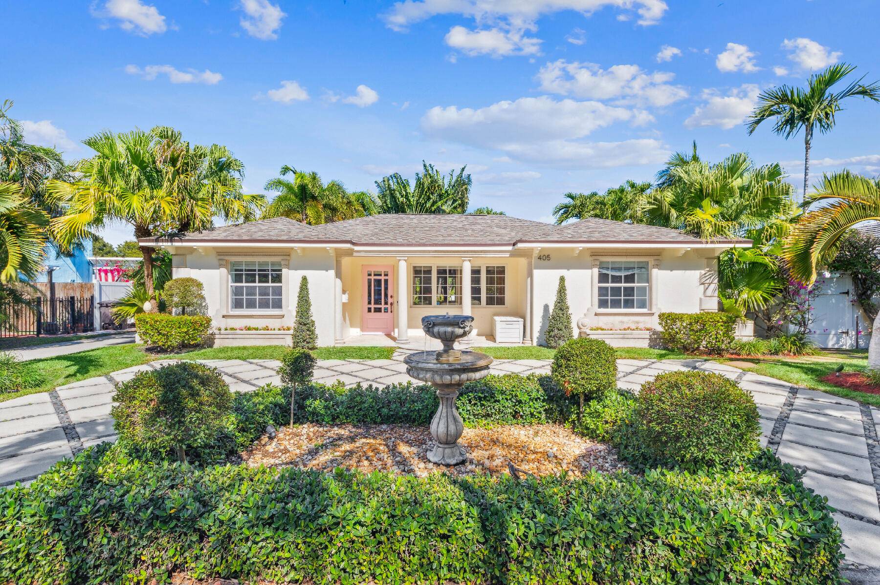 Open the front door to your personal oasis in Historic Northwood, one block from the intracoastal.