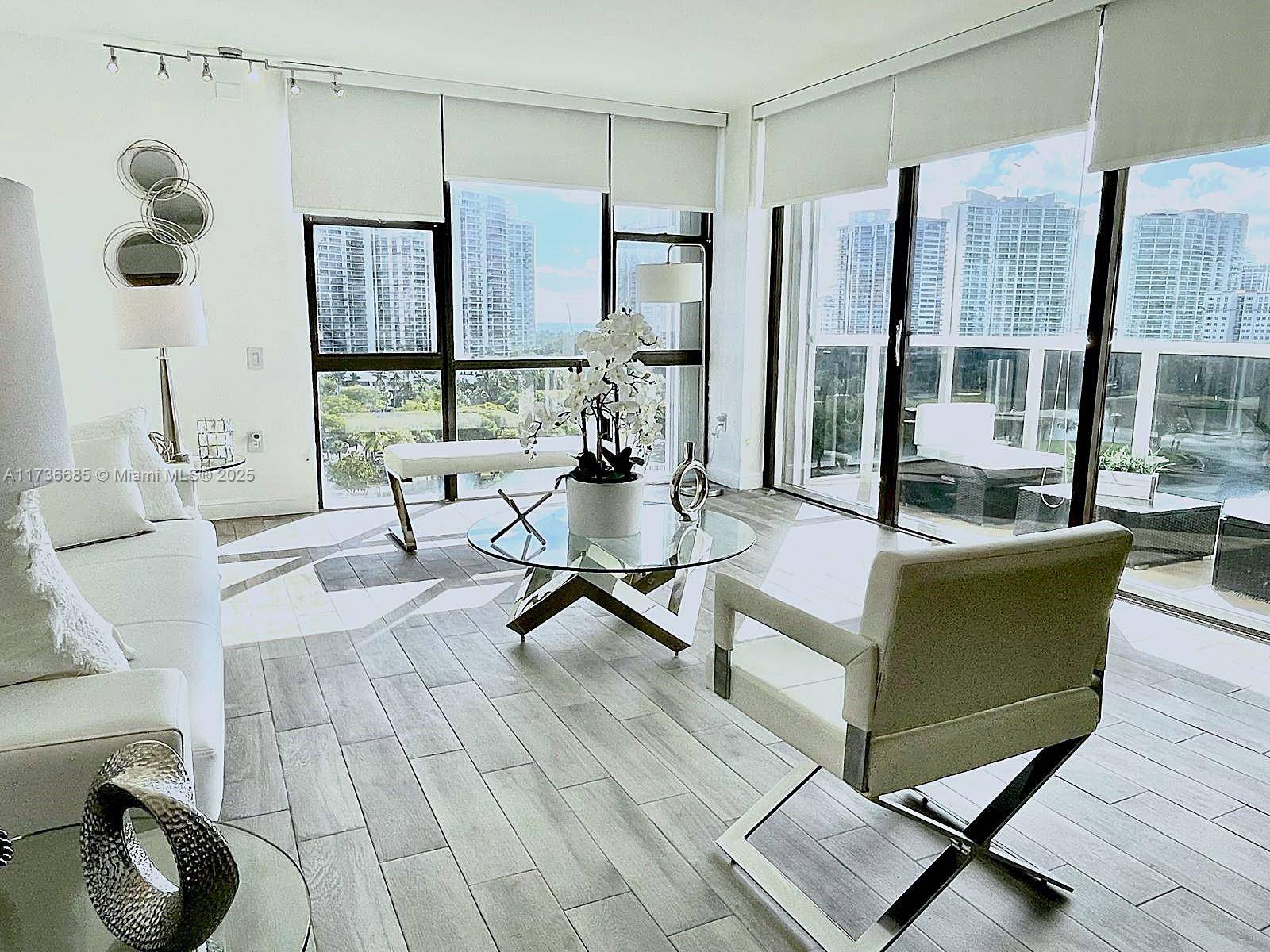 This stunning amp ; totally remodeled corner unit with panoramic water amp ; golf views from every room, has floor to ceiling windows amp ; a plethora of luxurious upgrades.