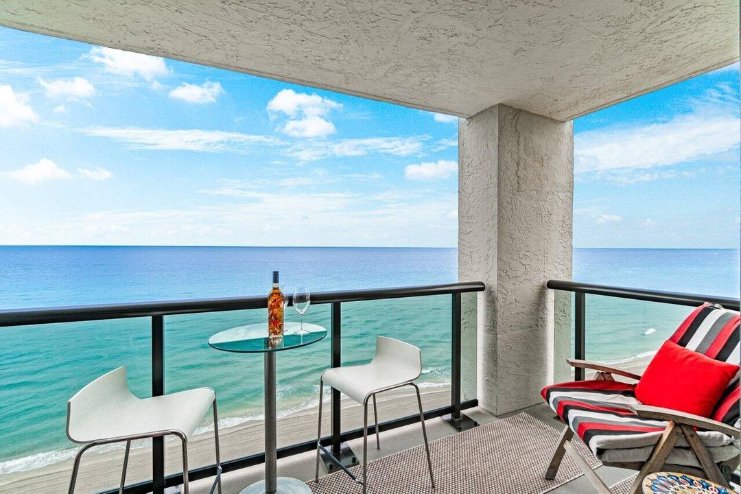 DIRECT, UNOBSTRUCTED PANORAMIC OCEANFRONT, Serene Retreat Experience true beachfront lifestyle in this exquisite, Southeast Corner, DIRECT ocean facing, 3 bedroom 2.