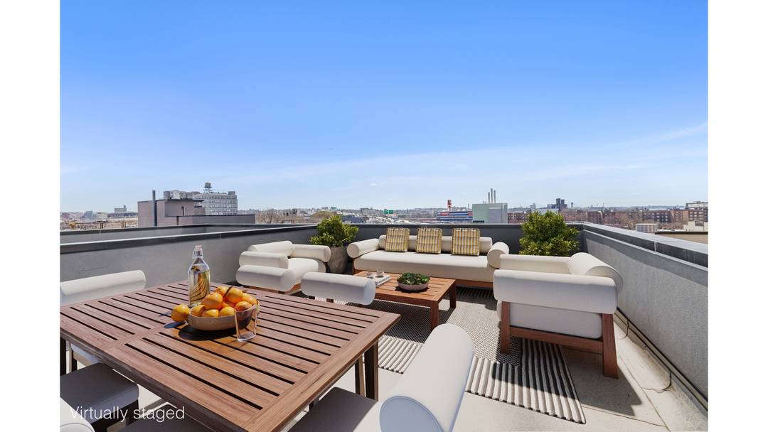 Introducing 112 Luquer Street, nestled in the vibrant heart of Carroll Gardens !