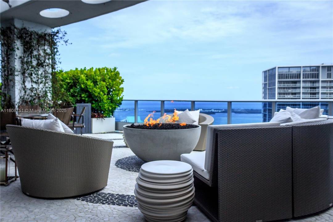 Experience elevated living in this professionally designed, ultra luxury two story penthouse at EPIC in Downtown Miami.