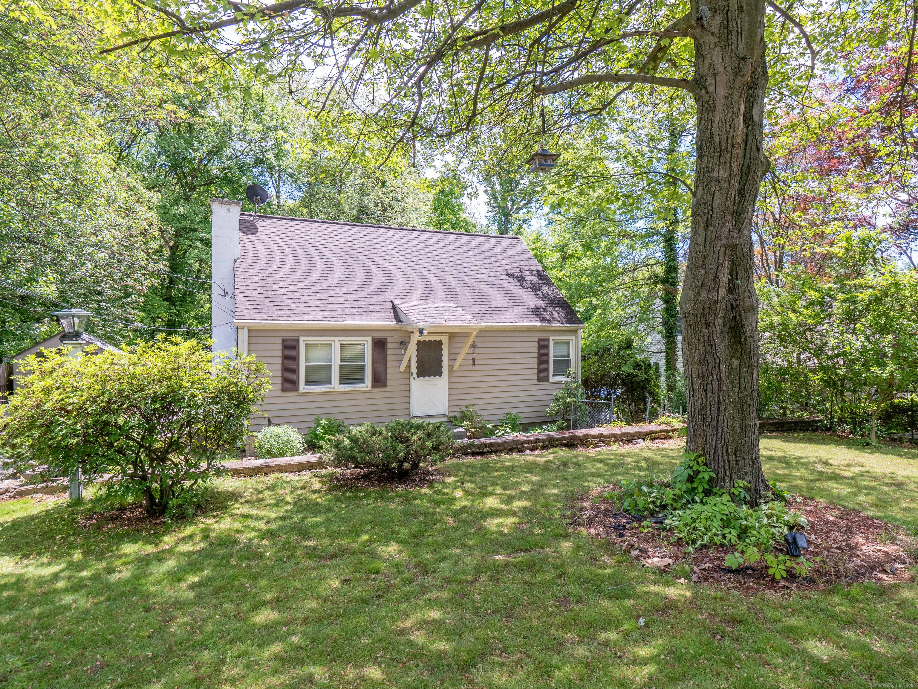Opportunity knocks ! Unlock the potential of this charming home in the ever convenient Brookside neighborhood minutes to the Darien line.