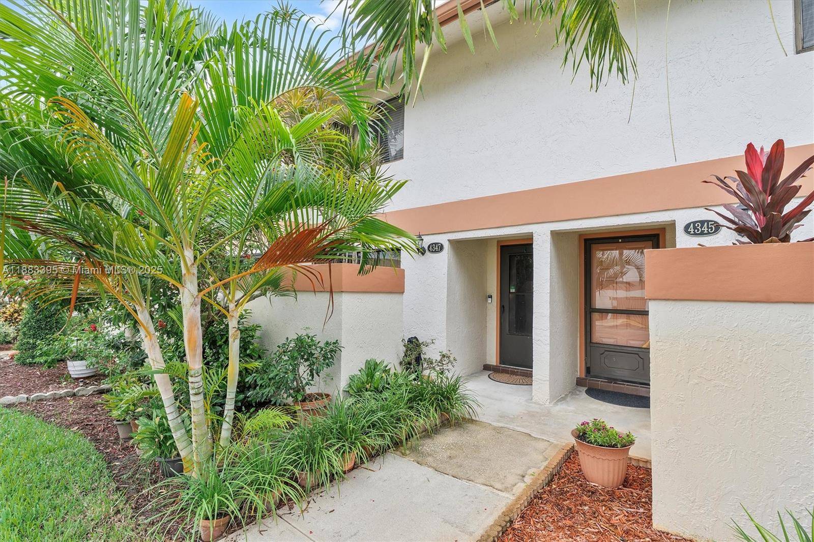Flooded with natural light from a 2 story screened porch, this 2 bed 1.