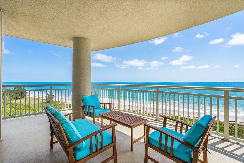 Perched on the 8th floor, this rare, corner unit offers uninterrupted panoramic ocean views from nearly every room a wraparound balcony that feels like your own private lookout.