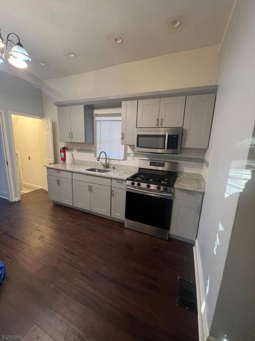 Perfect for first time homebuyers, this well maintained two unit property offers a smart way to own while generating income.