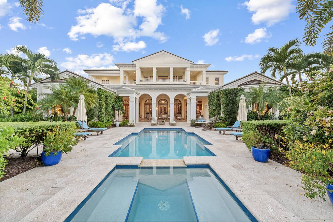 Situated within the exclusive community of Sailfish Point, this exceptional waterfront estate showcases 252 feet of direct water frontage with immediate ocean access.