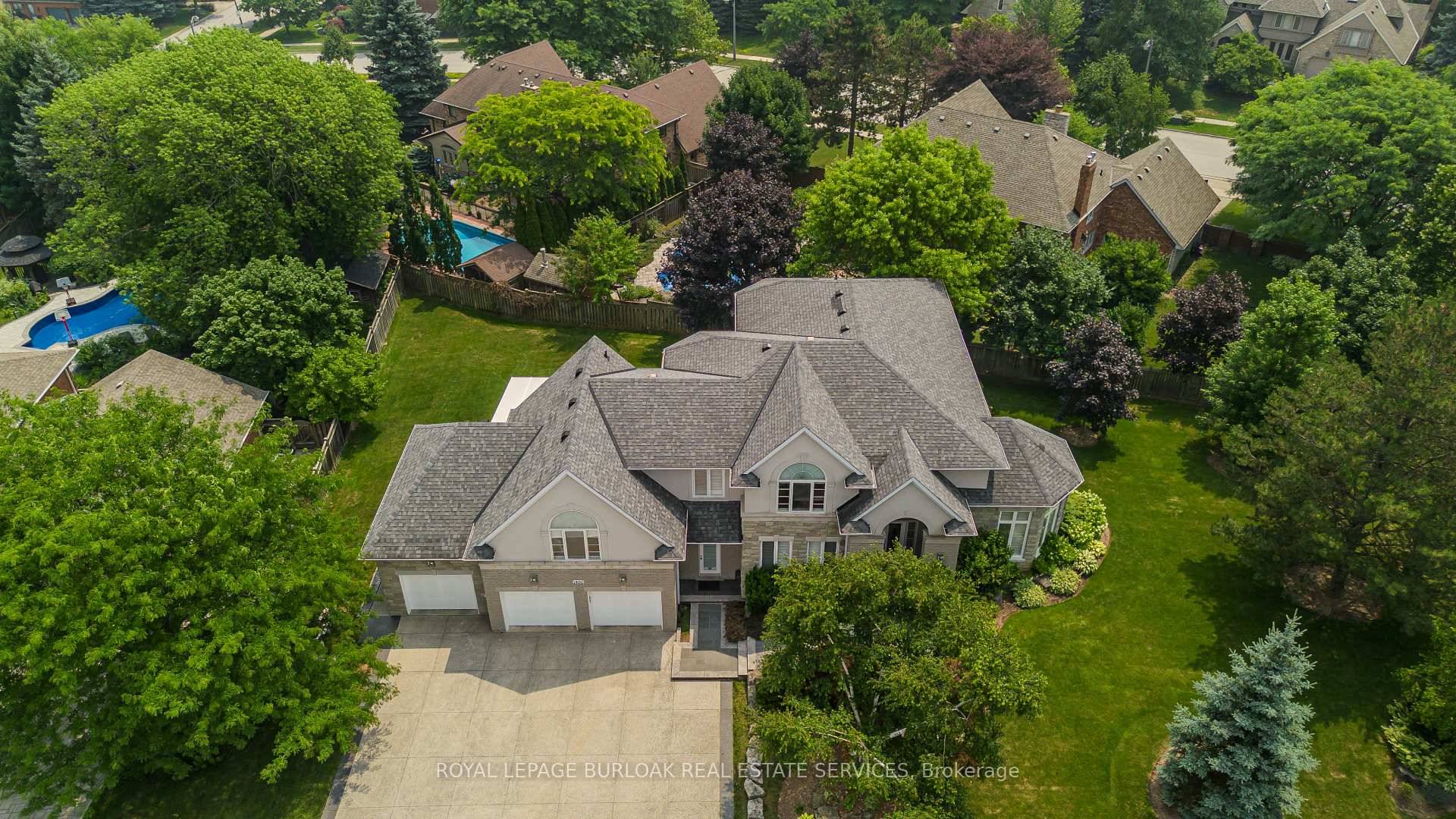 Welcome to this exceptional residence on a quiet court in the prestigious Tyandaga Highlands community.