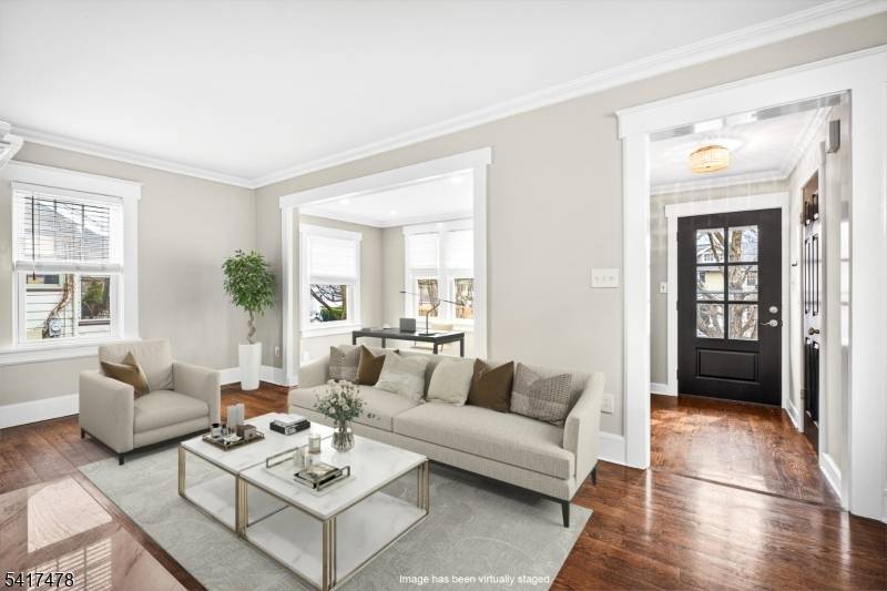 Spacious and inviting colonial cottage offering a thoughtfully designed layout that works beautifully for both everyday living and entertaining.