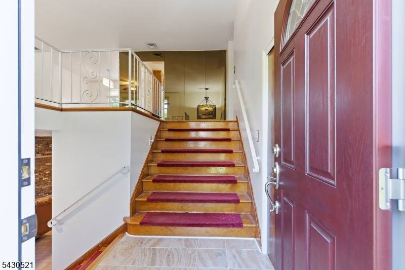 Nestled on a quiet cul de sac in a desirable Clark neighborhood, this beautifully maintained spacious 4 bedroom, 3 bath home offers a spacious and versatile layout designed for comfortable ...