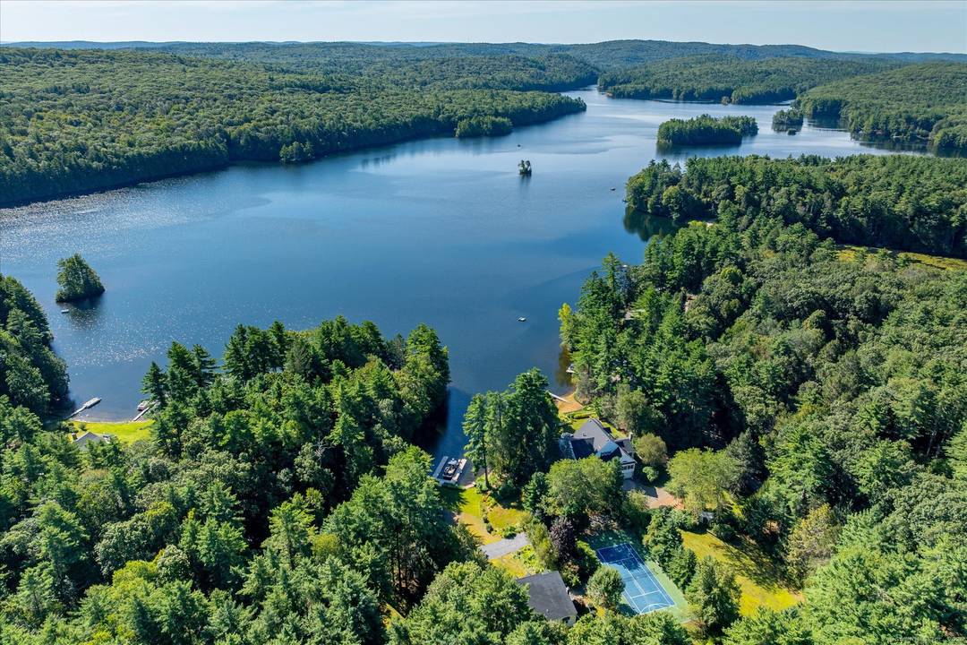 A rare lakefront estate on Lake Mashapaug, offering 5.
