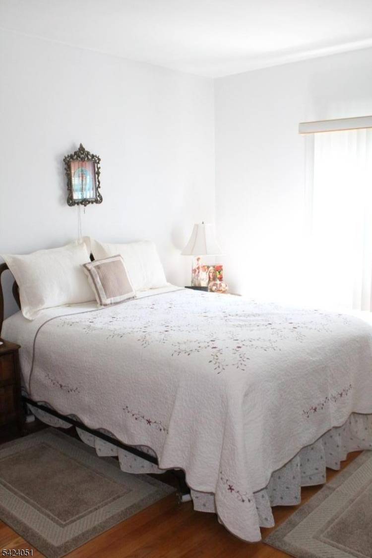 Spacious two family home offering 6 bedrooms, 3 full baths, large dining room and kitchens, level and inviting backyard, plenty of parking in exclusive driveway.