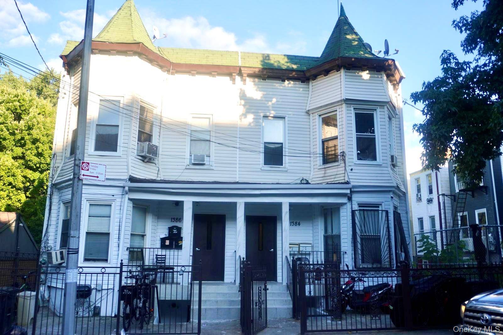 Charming and well maintained two family frame house featuring a spacious 3 bedroom unit over a 2 bedroom unit ideal for owner occupants or savvy investors !