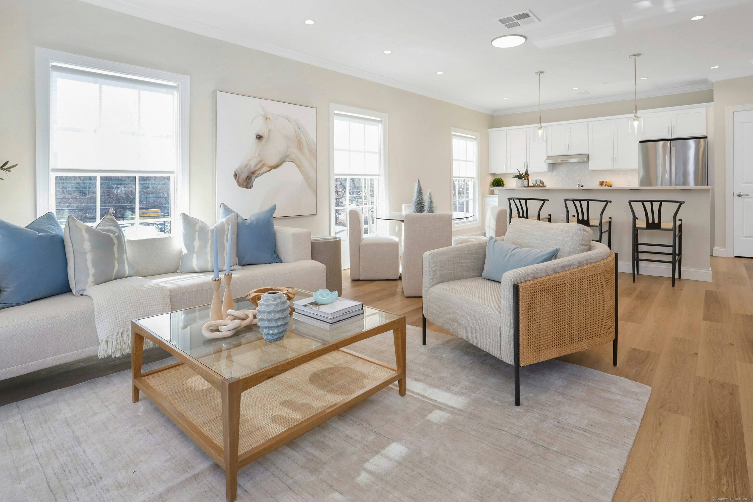 Welcome to this expansive 1, 974 sq ft residence at Heights Crossing Darien's premier new development offering elevated coastal living across the street from the Metro North station.