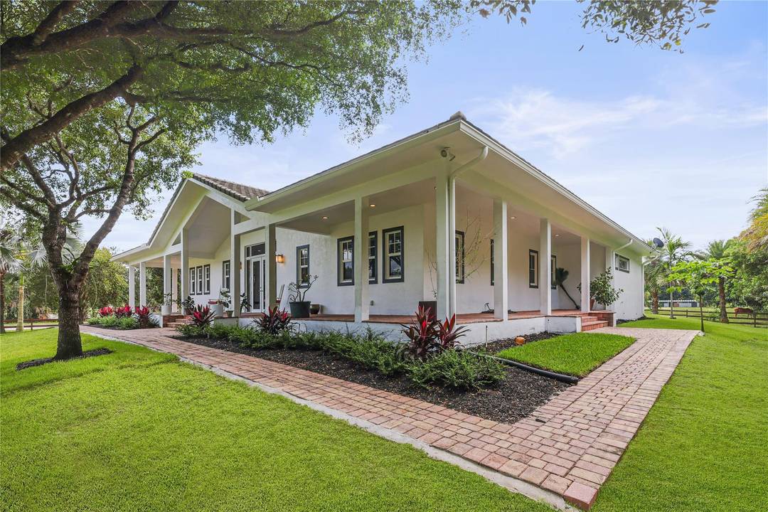 STUNNING 2015 CUSTOM BUILT RANCH HOME IN PRESTIGIOUS SUNSHINE RANCHES, SET ON OVER 2 ACRES WITH 4 BEDROOMS, 2.