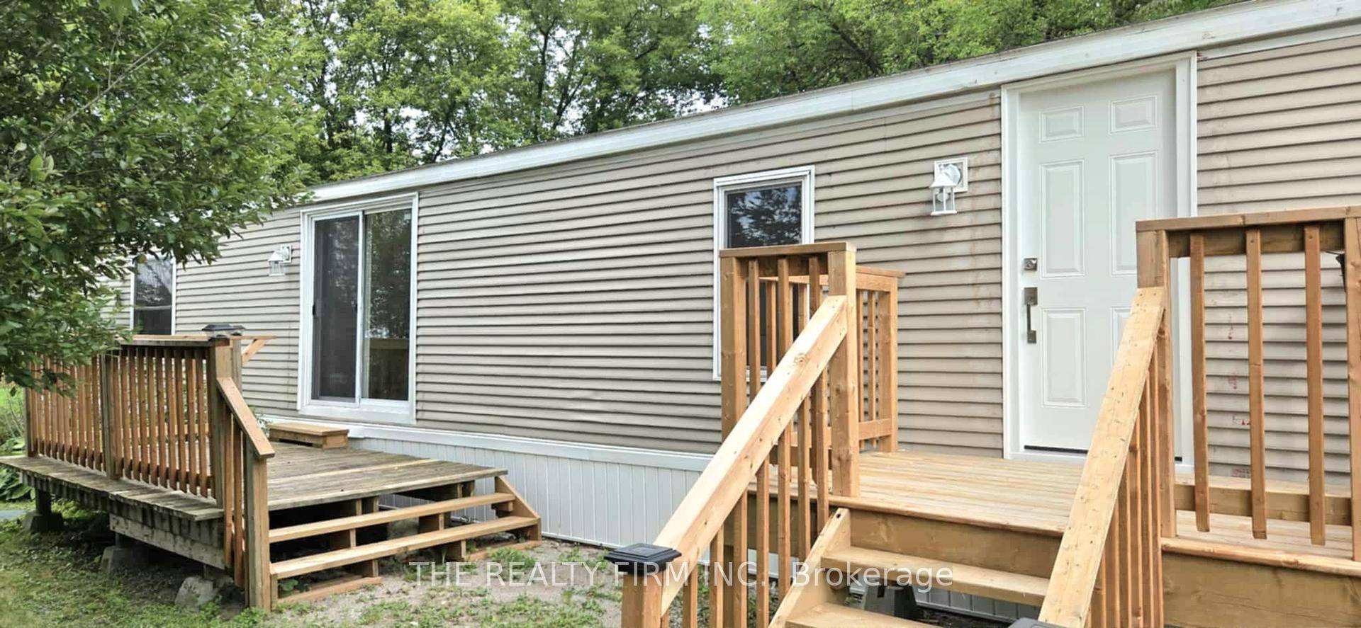 This unit is fully renovated, move in ready and on a large desirable corner lot !