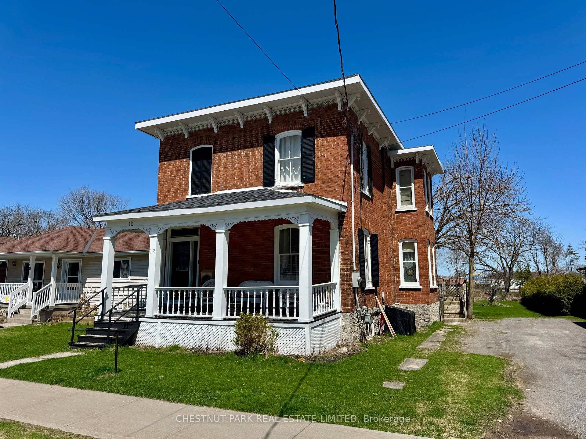 Welcome to this charming 2 storey brick century home nestled in the heart of Picton, Prince Edward County.