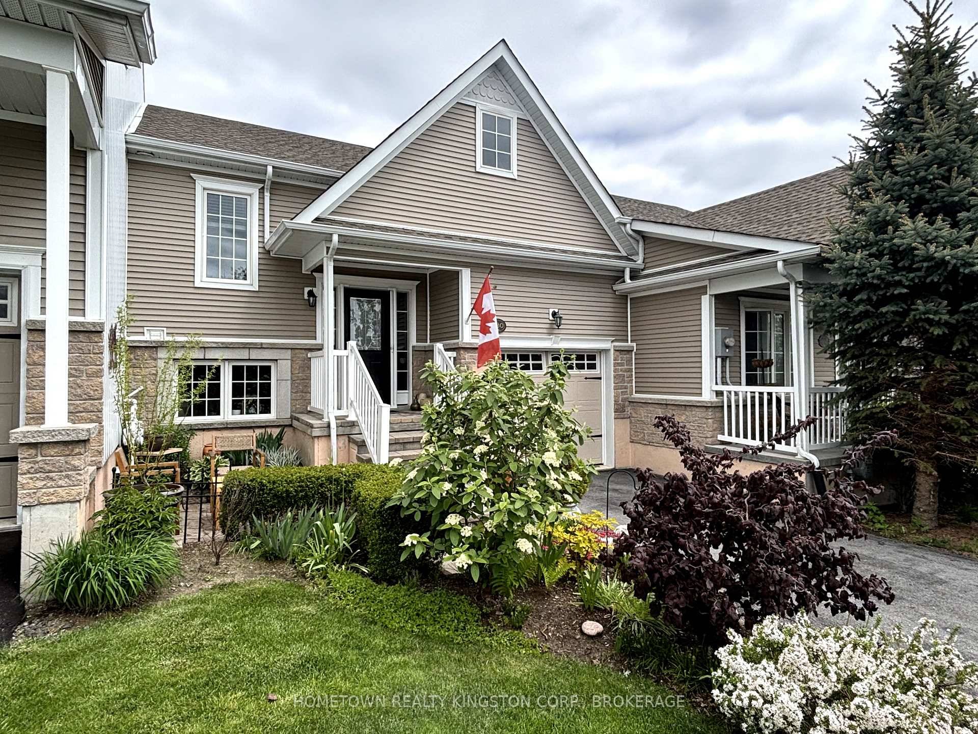 Pride of ownership is evident throughout this beautiful bungalow townhome located across from the first fairway of Loyalist Golf amp ; Country Club.