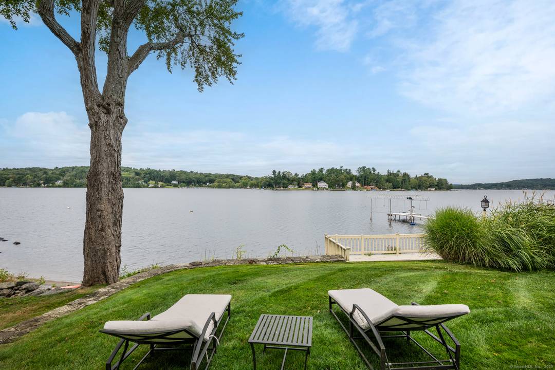 Lakefront home completely remodeled 4 years ago plus 2 story detached recreation building.