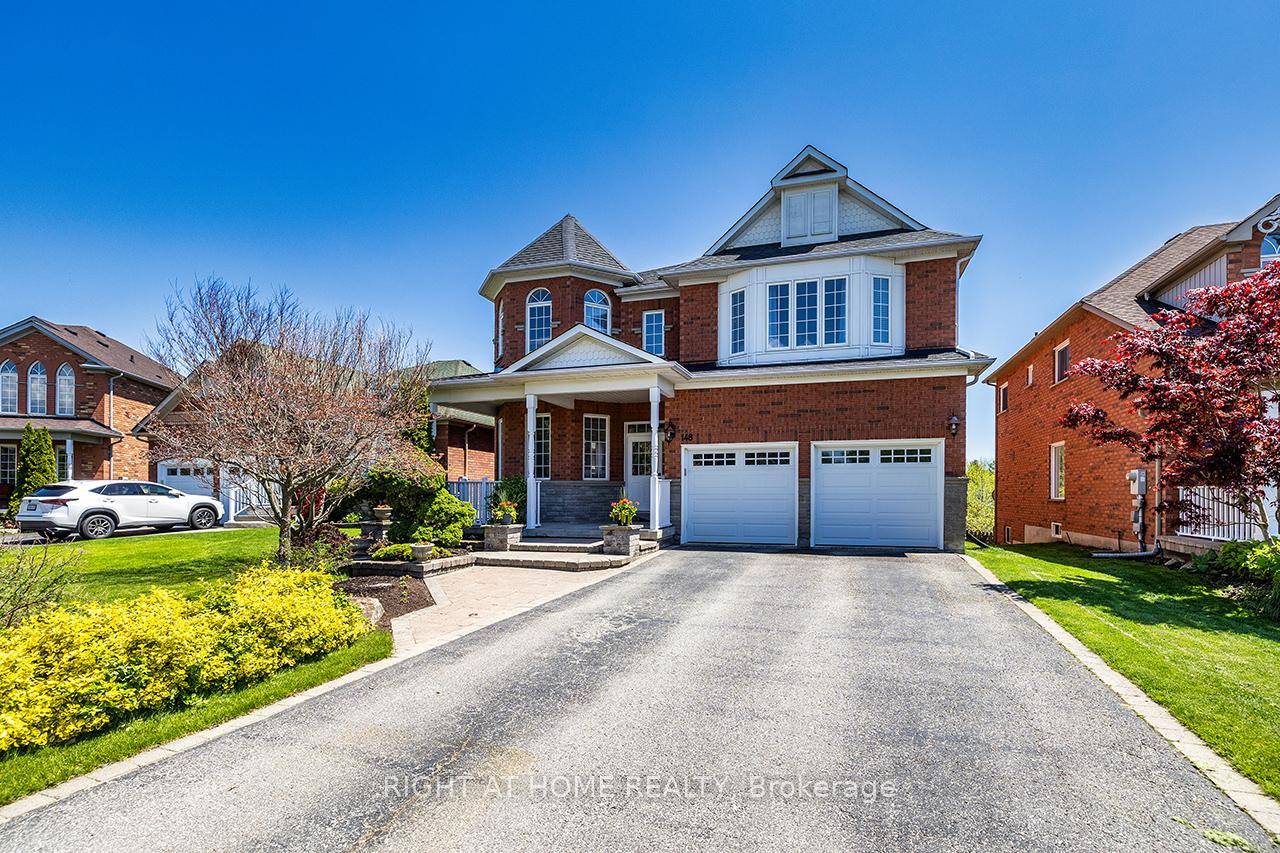 Welcome to this beautifully maintained executive home nestled on a private scenic ravine lot in a quiet village with no sidewalk.