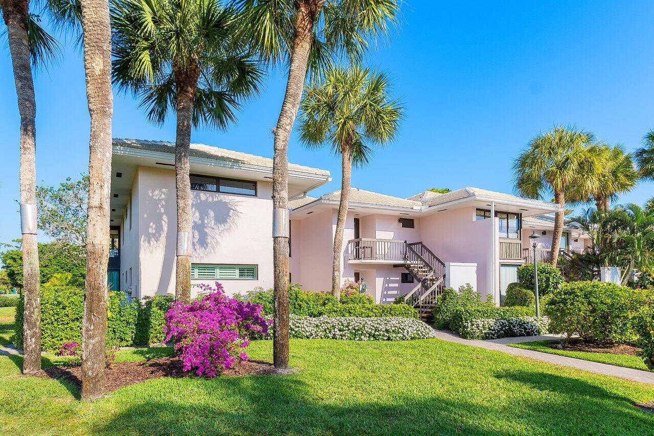 Experience the best of Quail Ridge in this stunning 2nd floor corner condo located in Blue Heron, offering breathtaking golf and lake views.