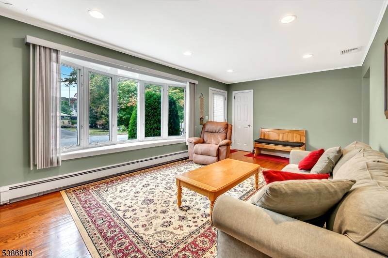 Charming two bedroom, one bath ranch set on a level and private lot in a convenient location close to shopping, highways, and public transportation.