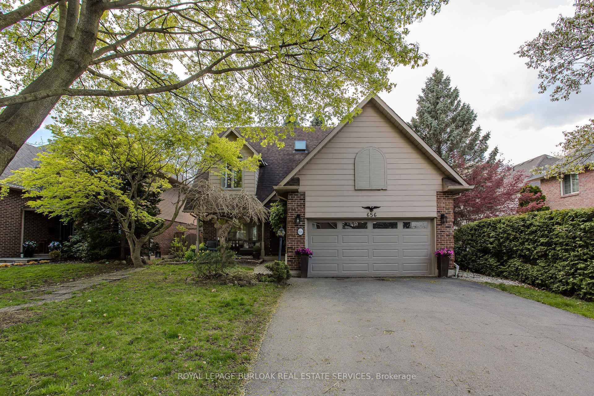 Tucked away on a quiet court, this spacious 4 1 bedroom, 2.