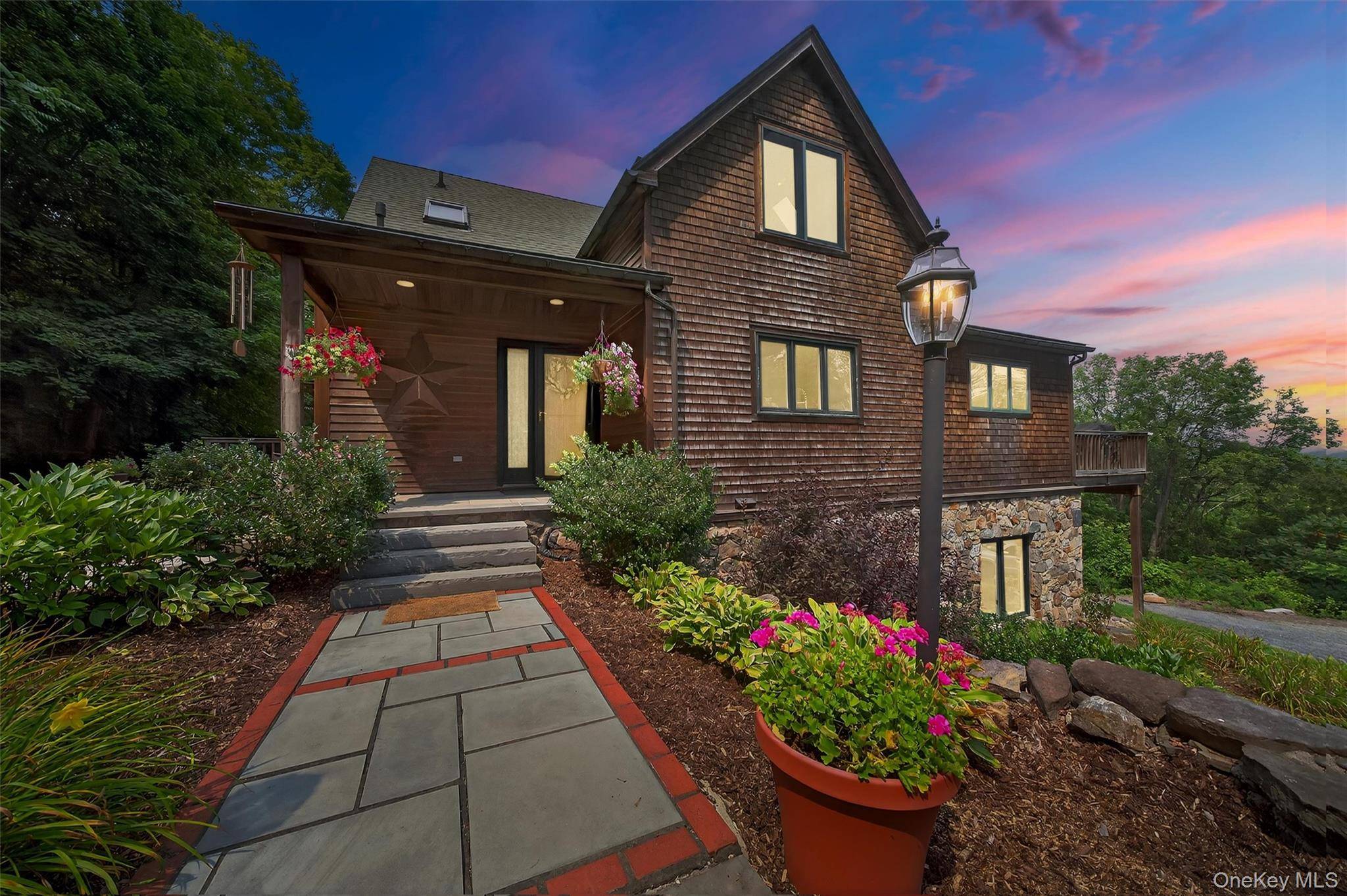 Set on nearly 9 serene, wooded acres, this custom Davis Frame Post amp ; Beam home offers sweeping views of Pine Island, NY, a charming hamlet within the Town of ...