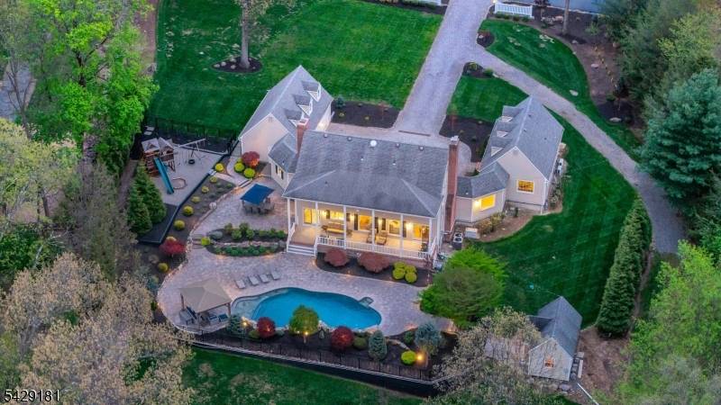 A rare offering of architectural distinction, this custom residence modeled after George Washington's Mount Vernon was designed and built by award winning builder Robert Shaw as his personal family home.