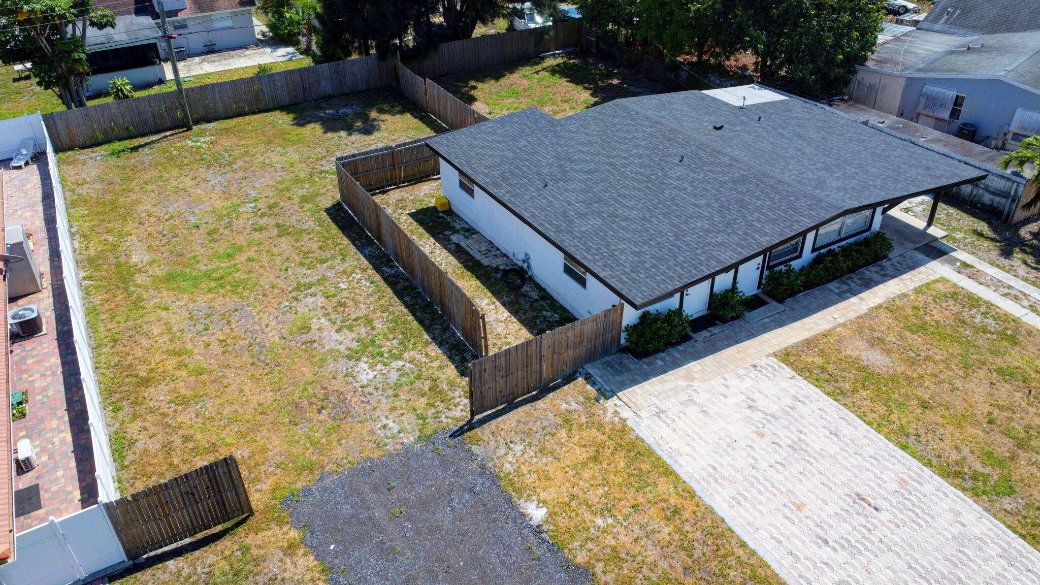 Exceptional Investment or Multi Generational Living Opportunity on Oversized Double LotOpportunity awaits with this fully renovated 4 bedroom, 2 bathroom home situated on an expansive double lot, complete with a ...