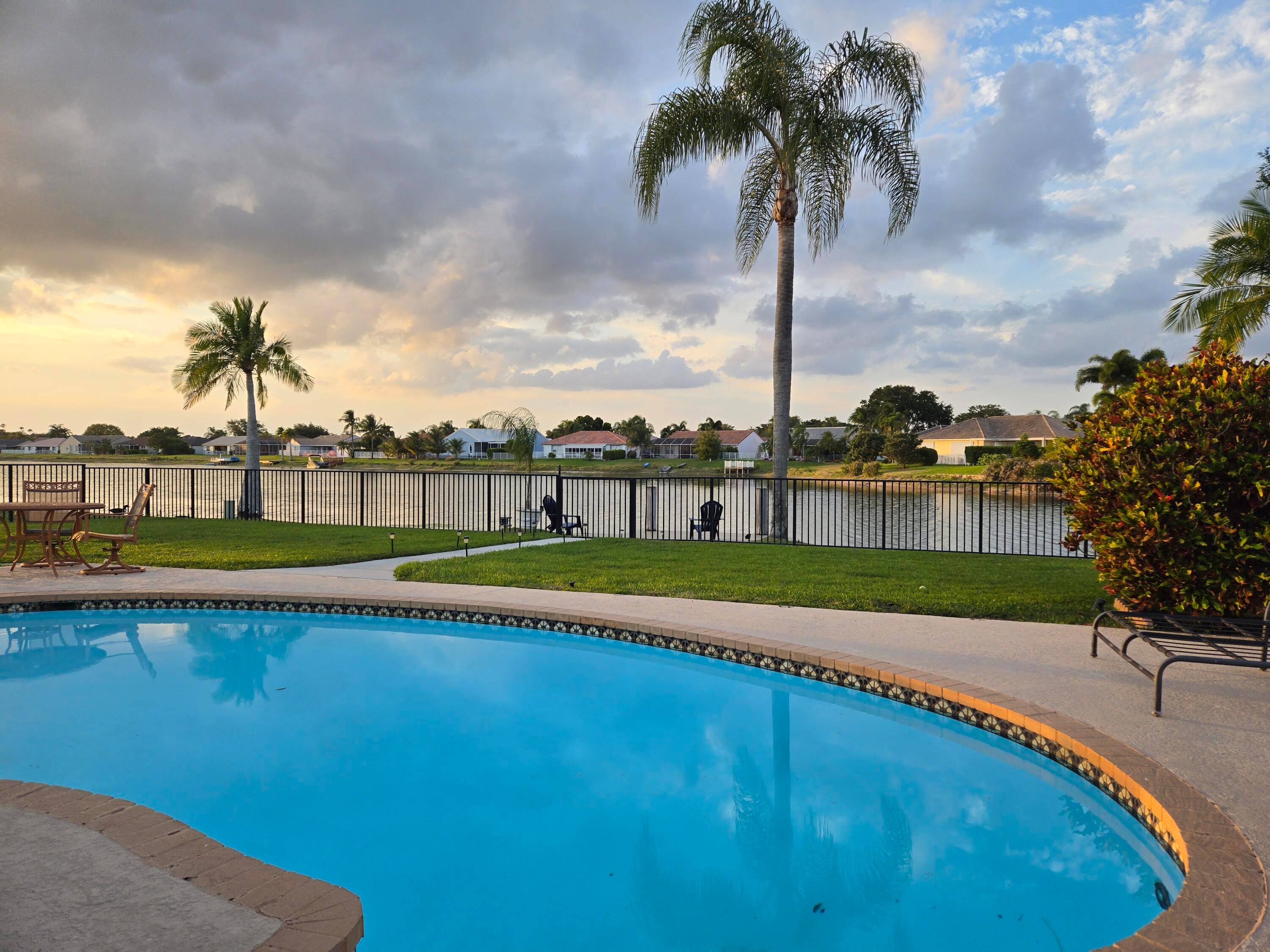 Prepare to be amazed by the stunning lake views from this waterfront home, situated on a spacious lot with breathtaking sunsets from your own private dock.