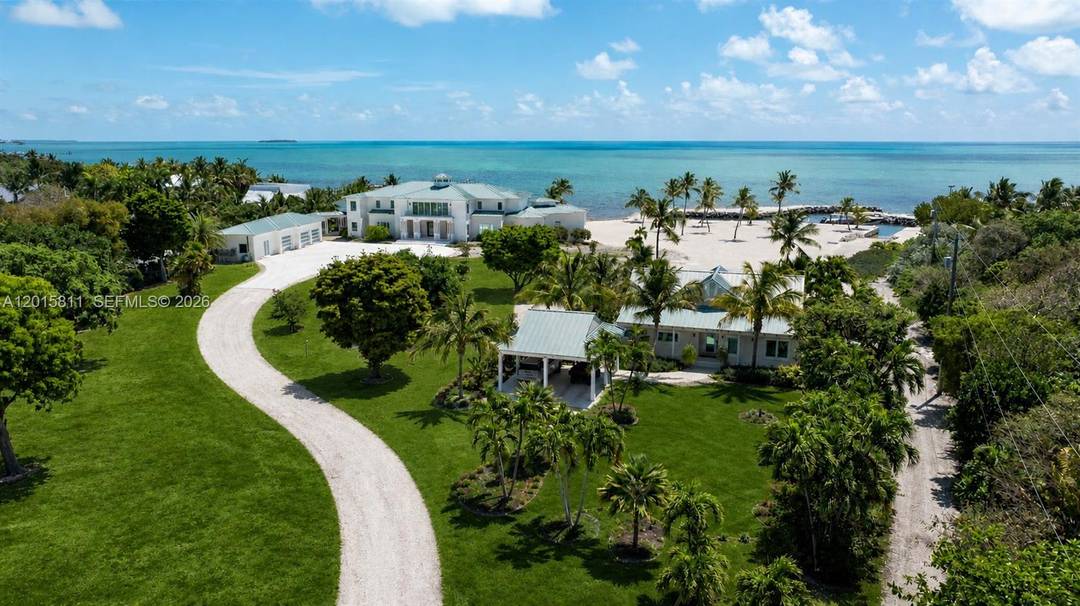 A rare dual parcel offering on prestigious Millionaire s Row in Tavernier, 88835 and 88845 Old Highway present an extraordinary opportunity to own one of the Upper Keys most expansive ...