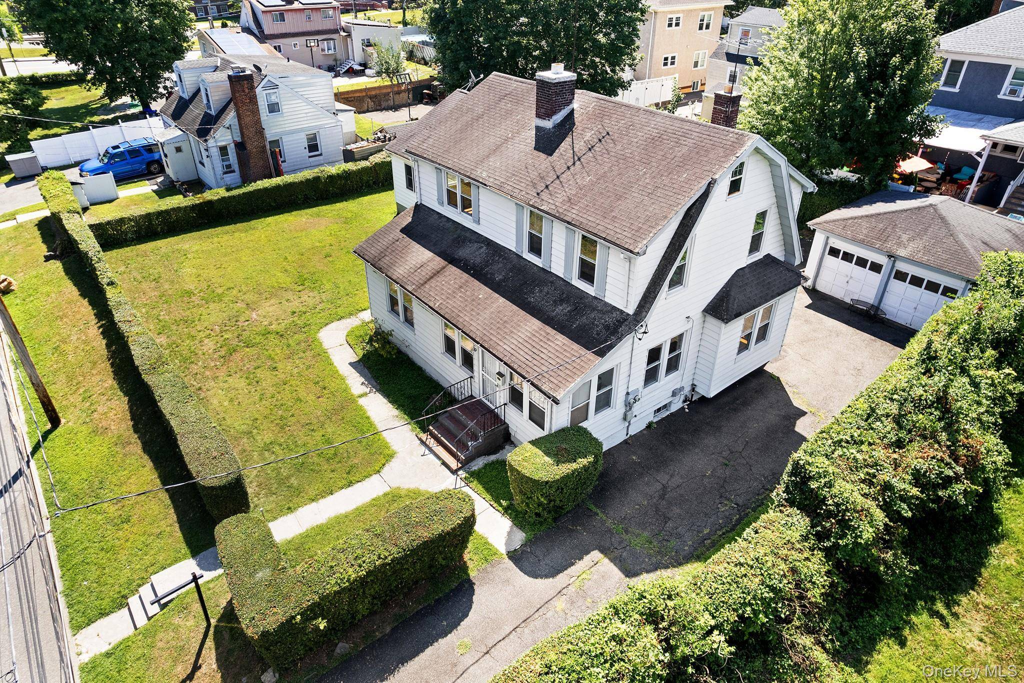 Welcome to this beautiful 5 bedroom, 3 full and 1 half bathroom home, featuring a legal accessory apartment with its own electric meter and private entrance, perfect for guests, extended ...