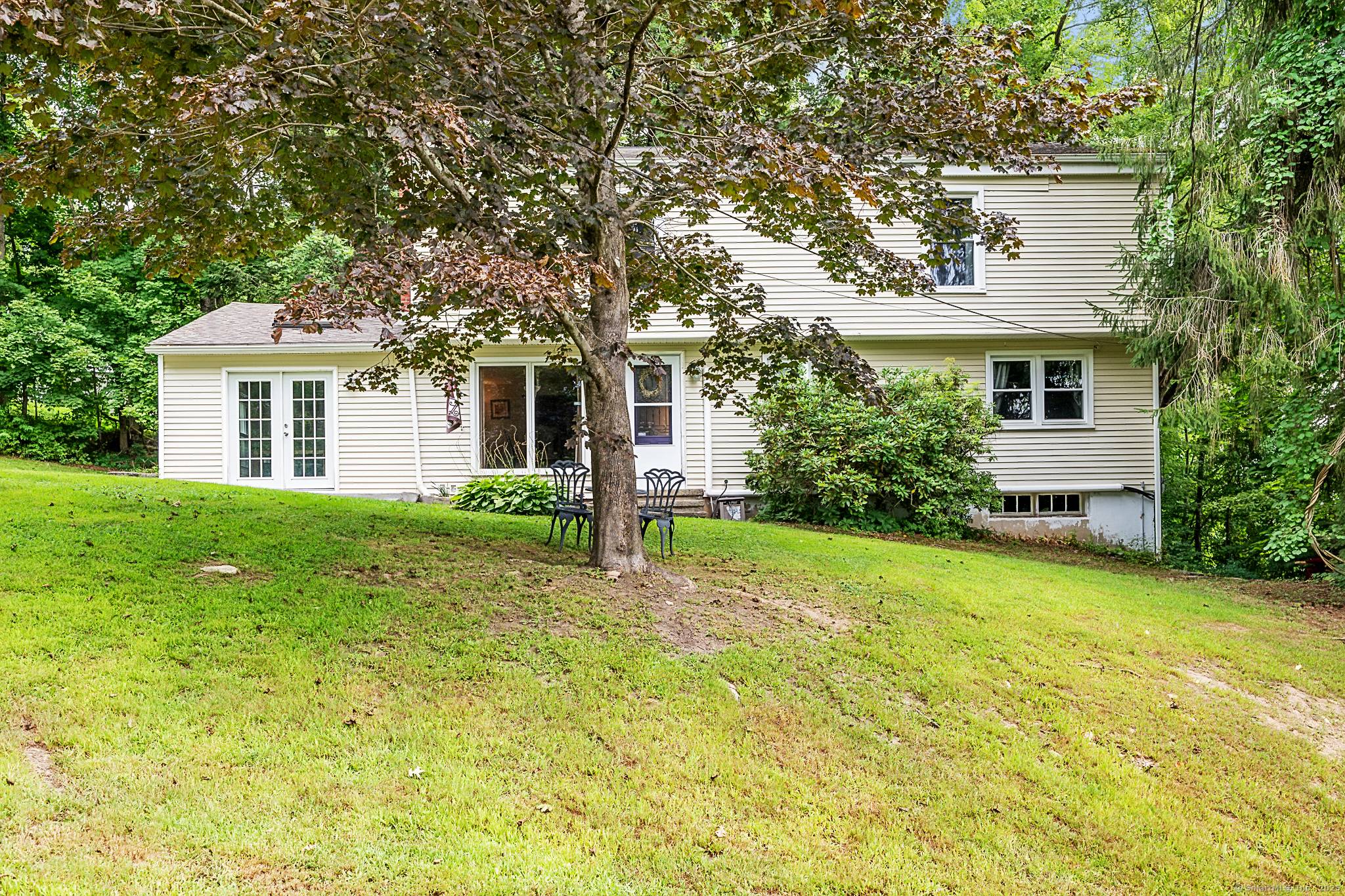 Welcome to this spacious Colonial home in Harwinton, nestled on a peaceful 0.