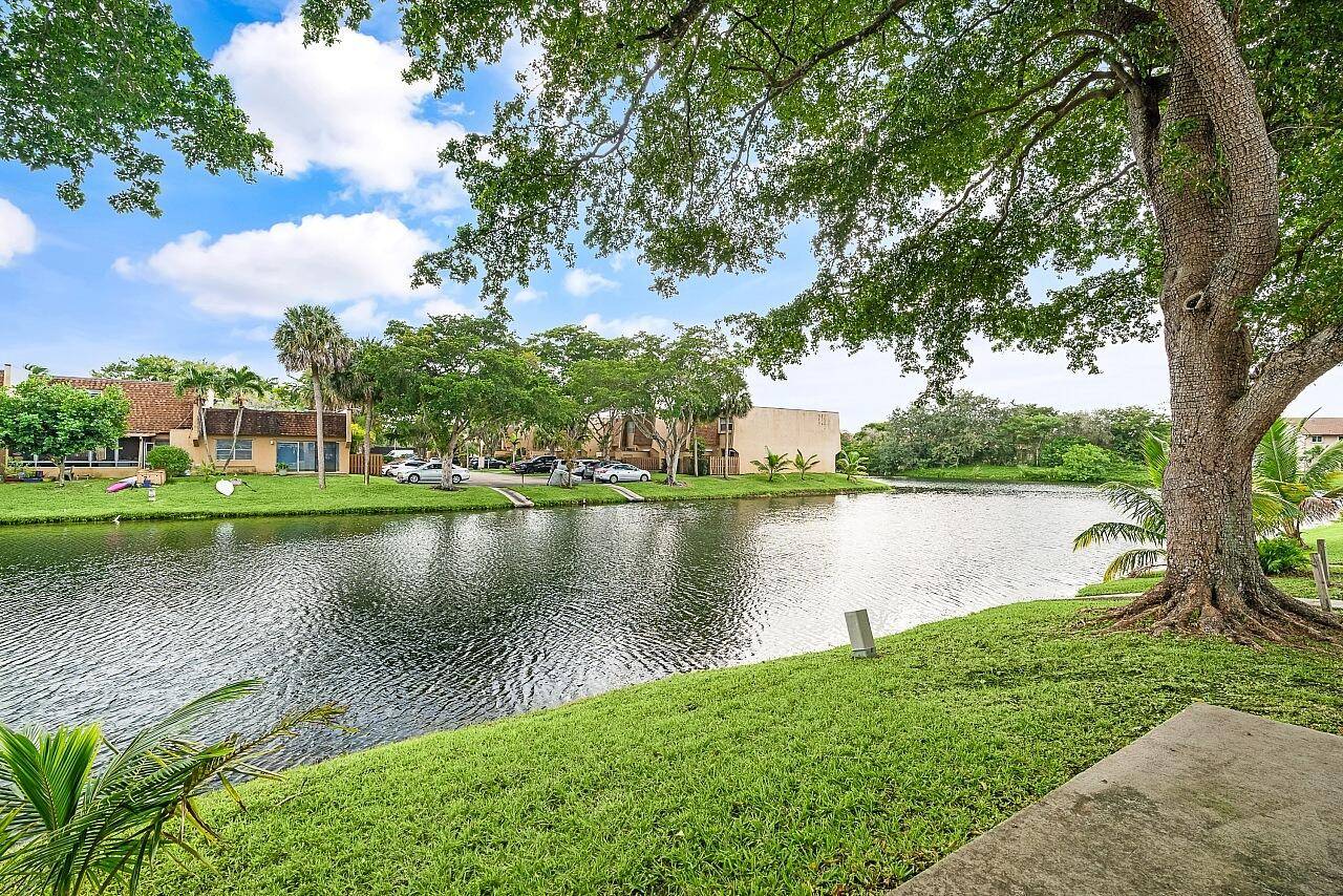 Discover serene lakefront living in this charming 2 bedroom, 2 bathroom townhome in the desirable Welleby community.