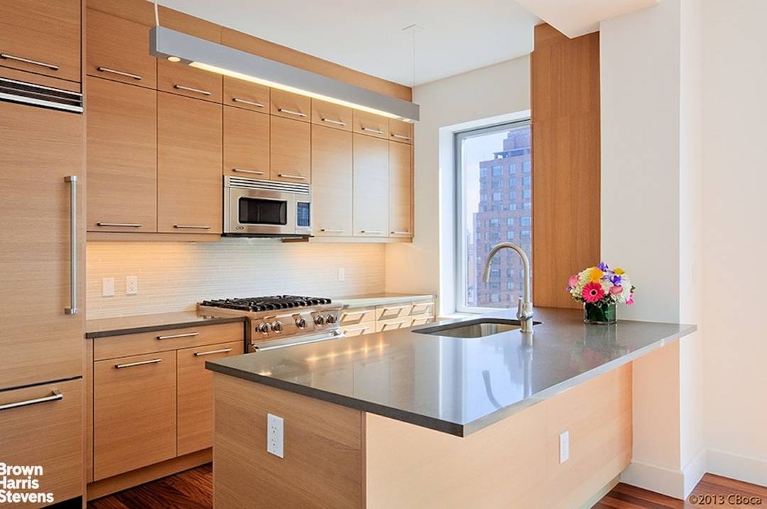 Apartment 19D is a stunning 2 bedroom, 2 1 2 bathroom residence with picturesque city views and a large balcony.